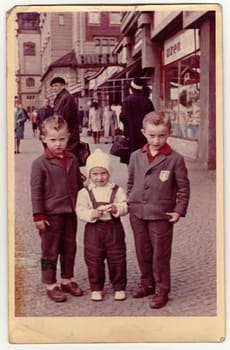 THE CZECHOSLOVAK SOCIALIST REPUBLIC - CIRCA 1960s: Vintage photo shows children (boys) pose on the city street.