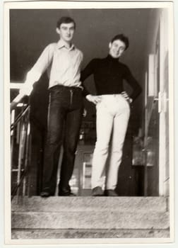 THE CZECHOSLOVAK SOCIALIST REPUBLIC - CIRCA 1980s: Vintage photo shows boys in the hall of residence (dormitory). Antique black white photo.