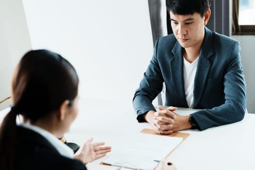 The signing of important documents between the lawyer and the client to enter into an agreement in a court case.