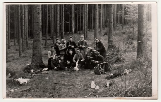 THE CZECHOSLOVAK REPUBLIC - CIRCA 1950s: Vintage photo shows rural women in the forrest . Black white antique photography.