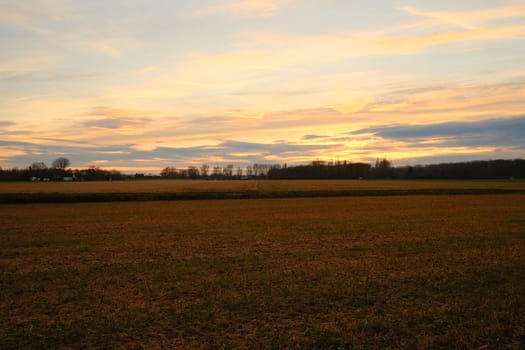 Beautiful rural landscape against scenic sunset in Meerbusch, Germany