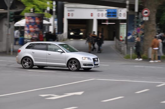 Silver Audi A3 8P while driving on intersection in Bochum, Germany.