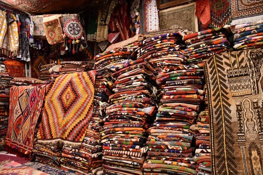 Colorful, oriental carpets at a carpet dealer in Goreme, Cappadocia, Turkey
