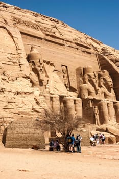 Abu Simbel, Aswan, Egypt - April 18 2008: Tourists visiting the archaeological site of Abu Simbel, Aswan, Egypt