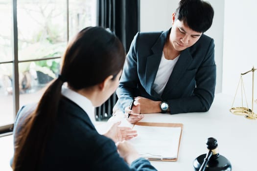 The signing of important documents between the lawyer and the client to enter into an agreement in a court case.