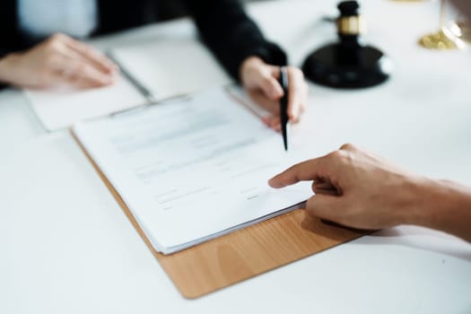 The signing of important documents between the lawyer and the client to enter into an agreement in a court case.