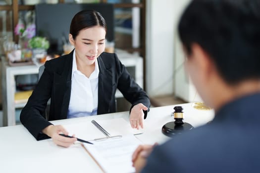 The signing of important documents between the lawyer and the client to enter into an agreement in a court case.