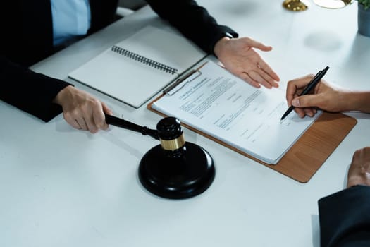 The signing of important documents between the lawyer and the client to enter into an agreement in a court case.