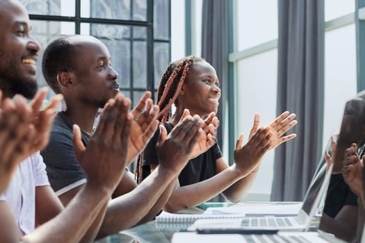 african american business team applaus in office