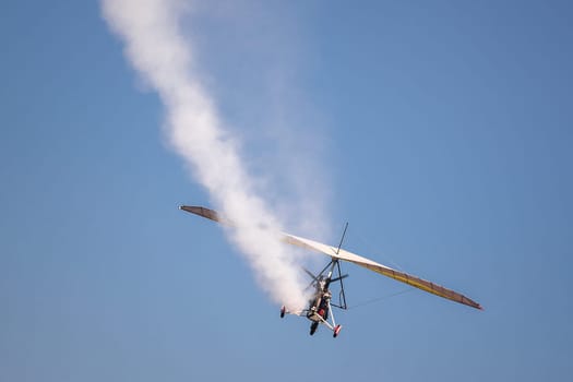 Small aircraft, motoplane makes an emergency landing, an accident in the sky.