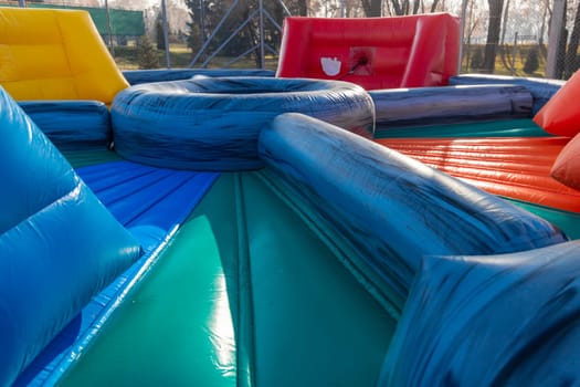 Inflatable trampoline for friendly outdoor sports competition.