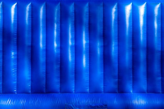Blue inflatable trampoline texture or background.