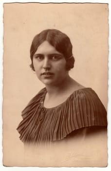 GERMANY - 1924: Vintage photo shows studio portrait of woman. Black white antique photography.