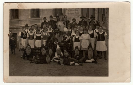 GERMANY - CIRCA 1930s: Vintage photo shows people amateur actors wear theatre costums. Some boys wear dwarfs costume.