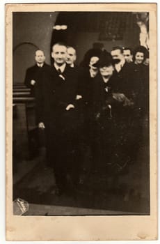 TtHE CZECHOSLOVAK REPUBLIC - CIRCA 1940s: Vintage photo shows wedding ceremony of mature couple. Black & white antique photography.