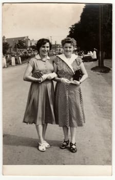 THE CZECHOSLOVAK SOCIALIST REPUBLIC - CIRCA 1960s: Retro photo shows women pose outdoors.