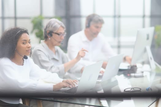 Business group working in customer and help desk office.