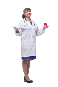Female scientific researcher in protective gloves holding beaker with red liquid. Cocept of solution at pharmacy microbiology laboratory