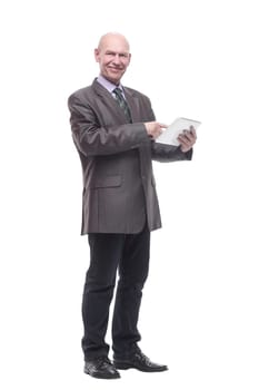 smiling business man with a digital tablet. isolated on a white background.
