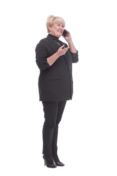 in full growth. business woman with a smartphone and takeaway coffee. isolated on a white background.