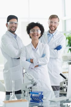 Scientists smiling together in lab