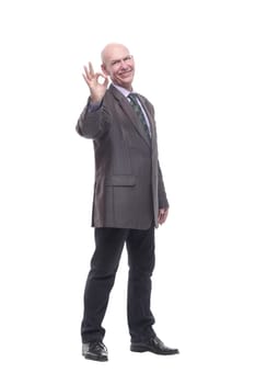 in full growth.Mature business man . isolated on a white background.