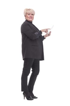 in full growth. adult business woman with a digital tablet. isolated on a white background.