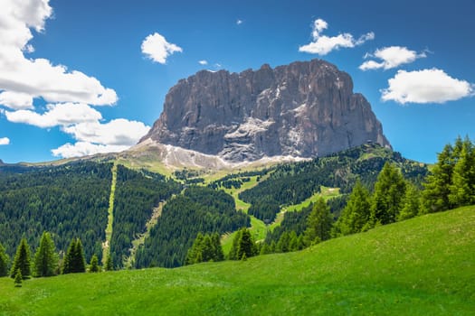 Idyllic landscape in Gardena pass valley and Sassolungo massif, italian Dolomites at springtime, Italy