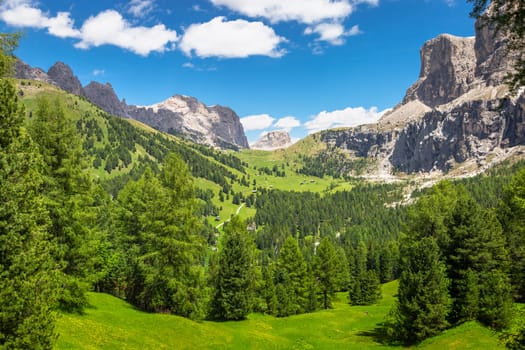 Idyllic landscape in Gardena pass valley and Sassolungo massif, italian Dolomites at springtime, Italy