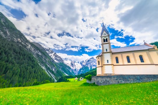 Idyllic village in Stelvio pass valley and Ortler massif, italian Dolomites at springtime, Italy