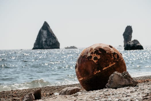 Old sea mine on the beach.