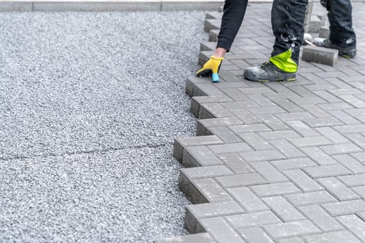 new sidewalk made of concrete interlocking paving blocks.