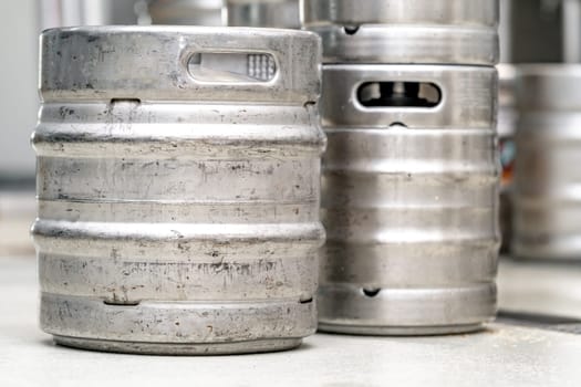 stainless steel beer barrel in the brewery. High quality photo