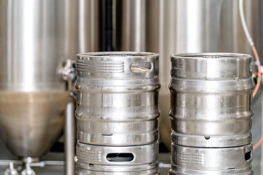 stainless steel beer barrel in the brewery. High quality photo