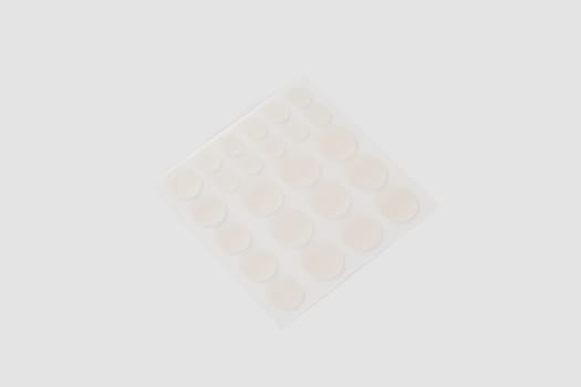 Set of round patches for acne on white background. Acne patches for the treatment of pimple and rosacea close-up. Facial rejuvenation cleansing cosmetology