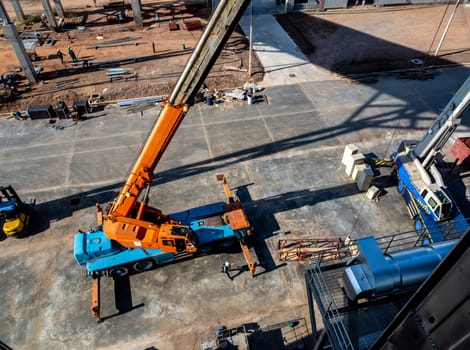 View from the top floor of the industrial plant of truck crane