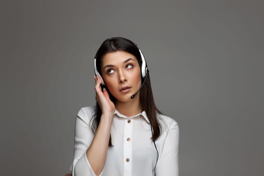 tired upset frustrated female call center agent is consulting clients online. Call center, business people concept