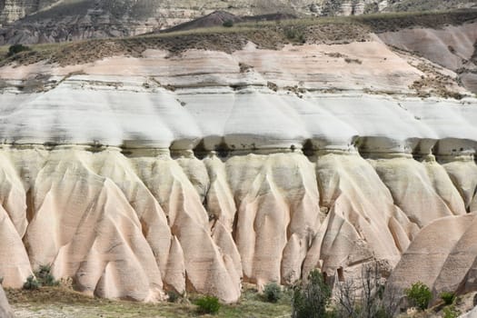 View of the multicoloured sandstone rocks, sediments in the Rose Valley in the Cappadocia, Turkey