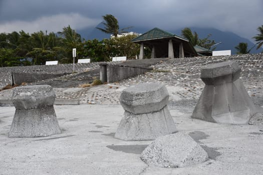 Concrete wavebreakers on the beach in Xincheng Township, Taiwan.