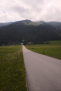 Beautiful scenic view of the Mountains with a cloudy sky in Austria