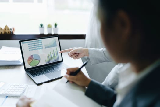 Asian entrepreneurs and business people meeting in a conference room in business planning, financial budget and investment risk assessment to analyze customer groups to increase company growth.