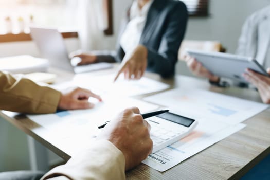 Asian entrepreneurs and business people meeting in a conference room in business planning, financial budget and investment risk assessment to analyze customer groups to increase company growth.