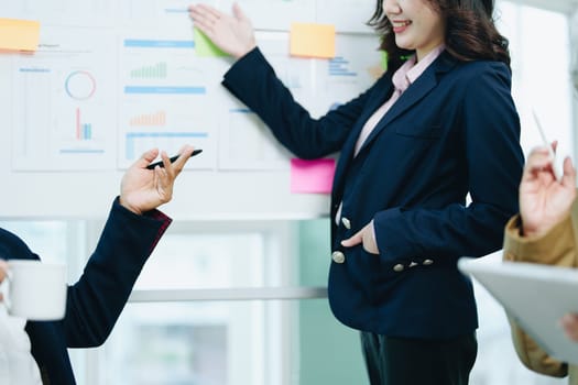 Asian entrepreneurs and business people meeting in a conference room in business planning, financial budget and investment risk assessment to analyze customer groups to increase company growth.