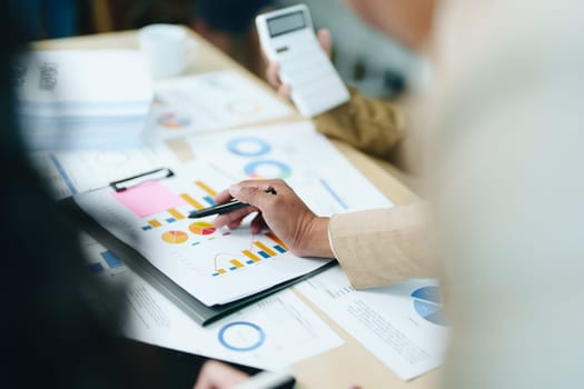 Asian entrepreneurs and business people meeting in a conference room in business planning, financial budget and investment risk assessment to analyze customer groups to increase company growth.