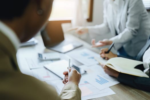 Asian entrepreneurs and business people meeting in a conference room in business planning, financial budget and investment risk assessment to analyze customer groups to increase company growth.