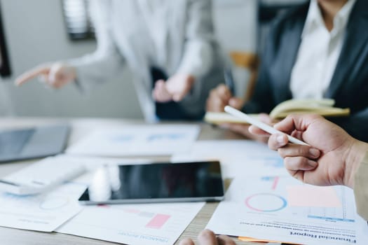 Asian entrepreneurs and business people meeting in a conference room in business planning, financial budget and investment risk assessment to analyze customer groups to increase company growth.