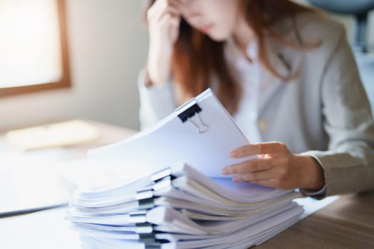 Portrait of sme business owner, man using computer and financial statements Anxious expression on expanding the market to increase the ability to invest in business.