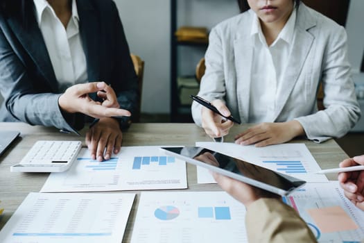 Asian entrepreneurs and business people meeting in a conference room in business planning, financial budget and investment risk assessment to analyze customer groups to increase company growth.