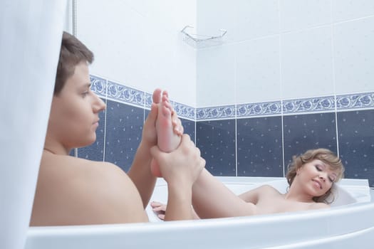 Portrait of sexy couple in bathroom
