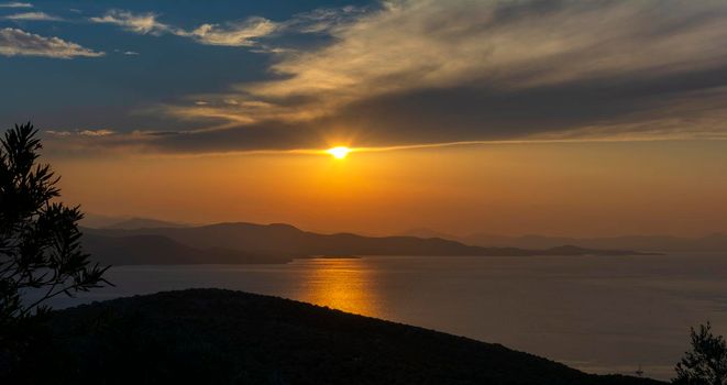 Beautiful sunset over the Aegean Sea in Pelion Peninsula, Greece.